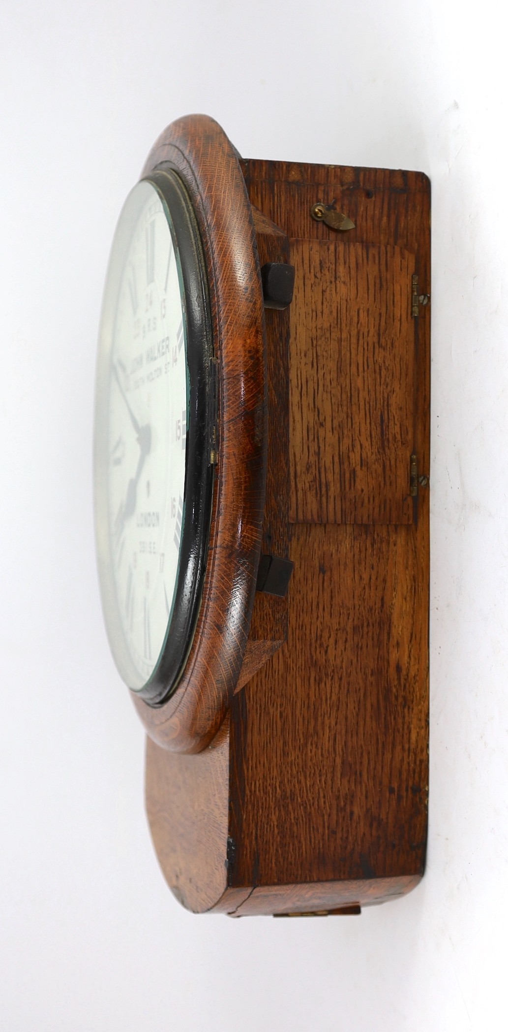 John Walker, South Milton St, London. An Edwardian oak cased drop dial wall timepiece with British Rail South inscription, width 37cm height 46cm